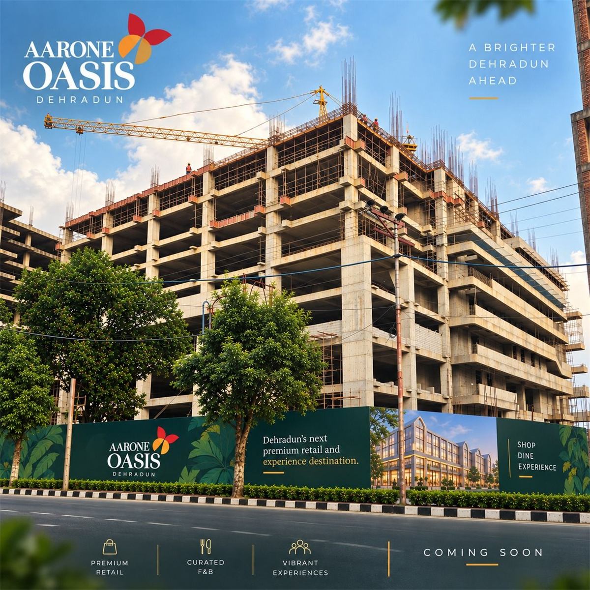 Aarone Oasis under construction on Rajpur Road, with project hoarding along the road